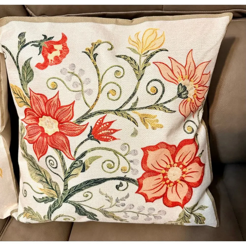 Two throw pillows featuring embroidered look floral pattern NEW